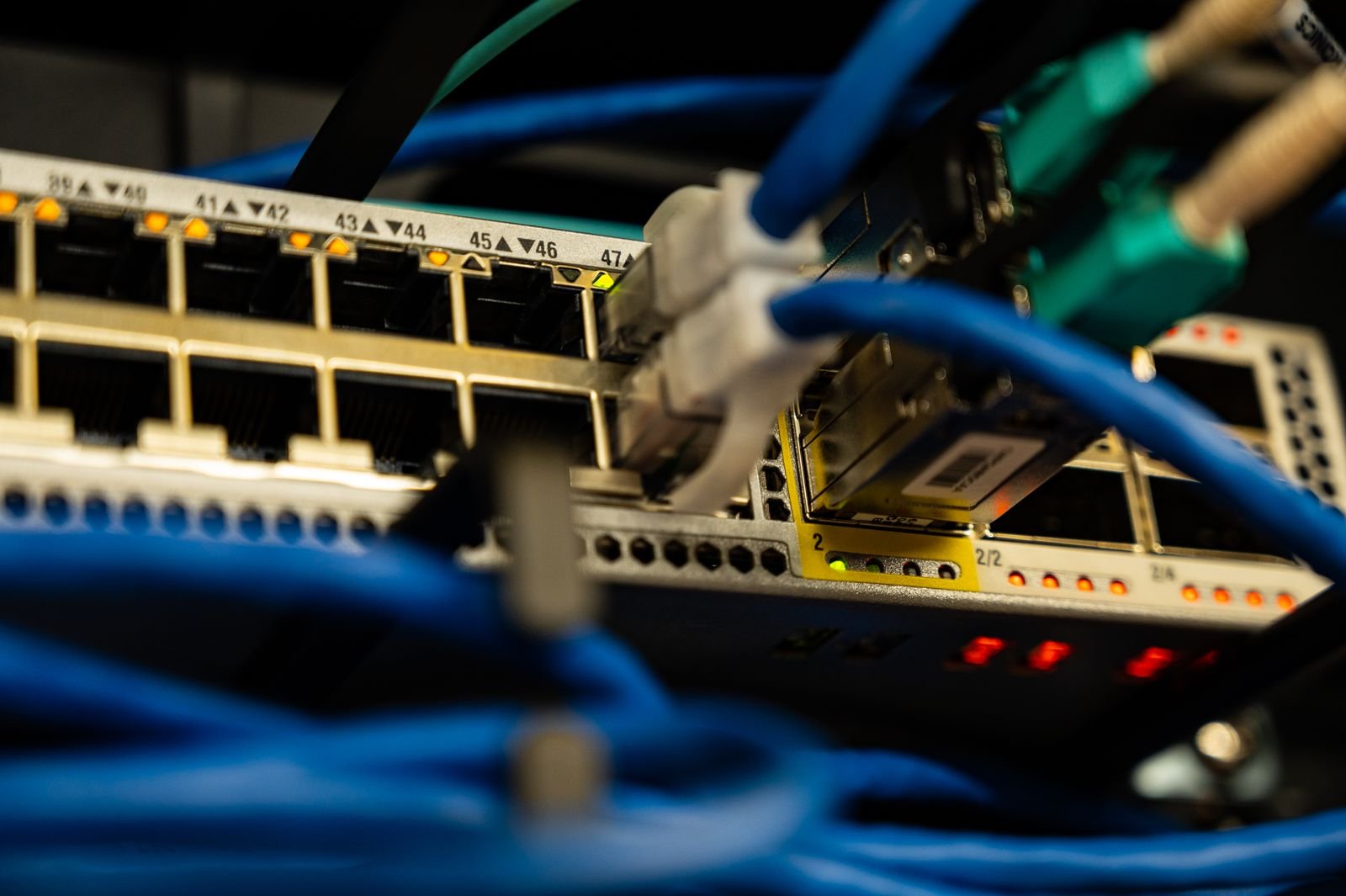 Close-up of a network switch with patch cables