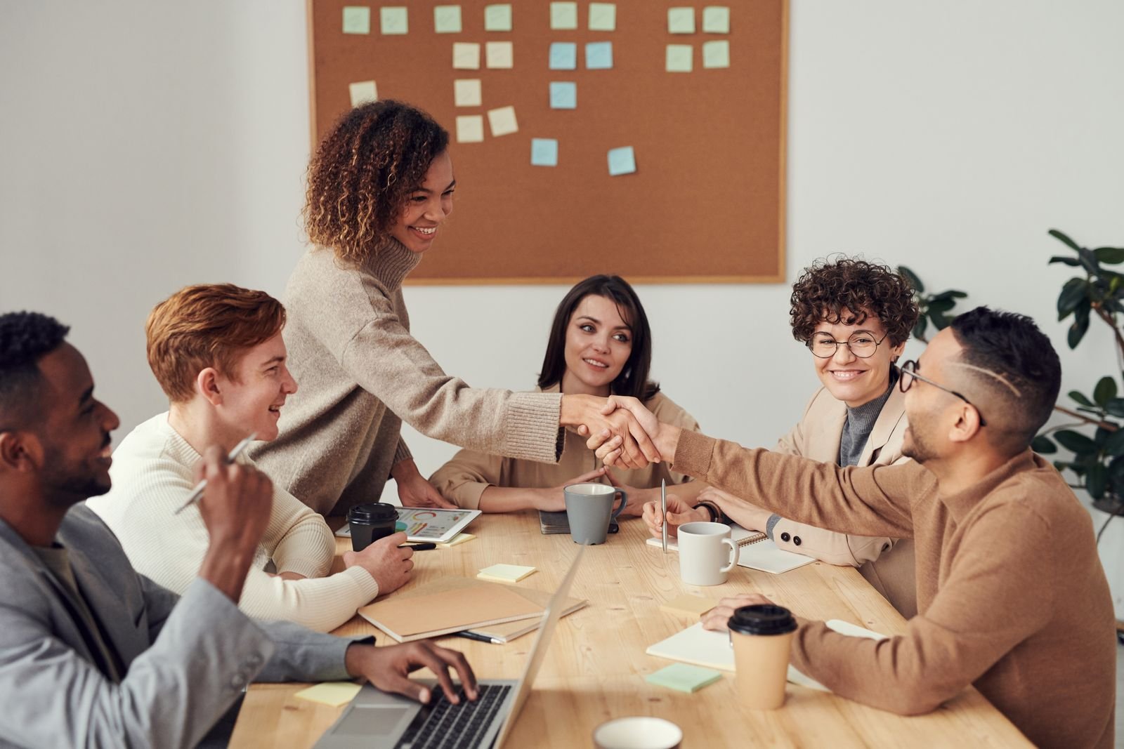 Engineering team collaborating around a table